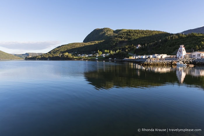 Still water reflecting the scenery beside Bonne Bay. 