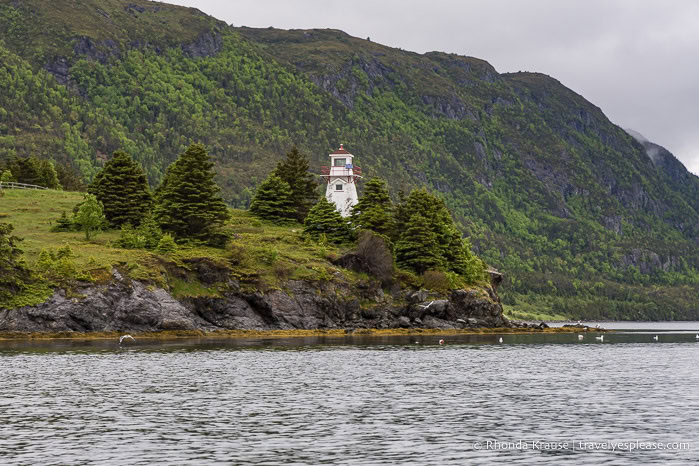 Woody Point Lighthouse backed by the cliffs of Bonne Bay.