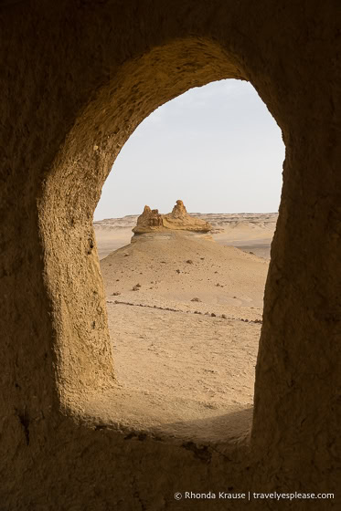 Looking out a window towards the desert.