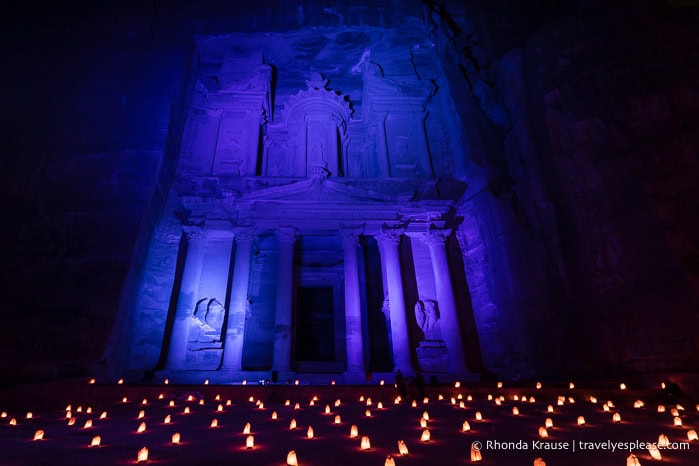 The Treasury illuminated in blue light.