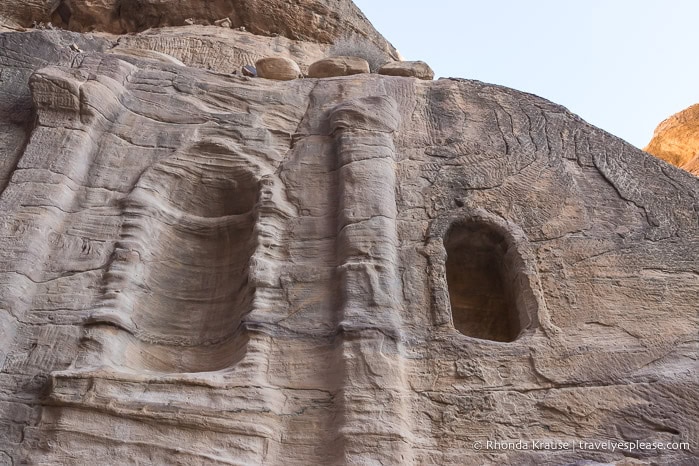 Niches in the rock walls of the Siq.