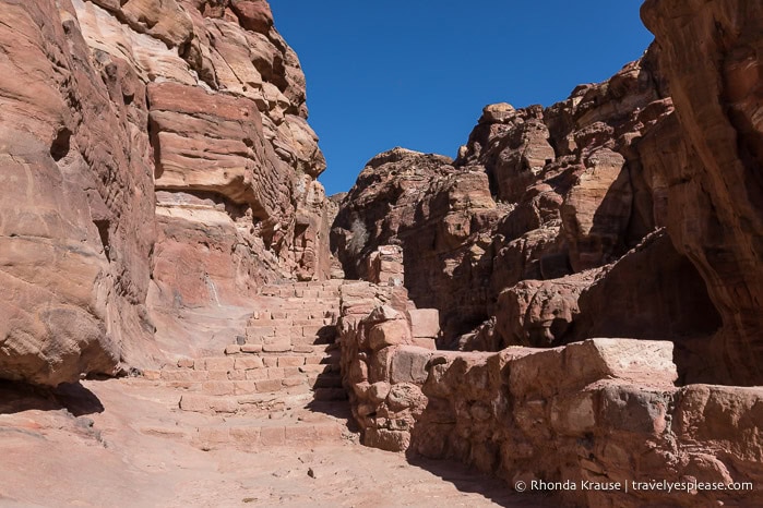 Stairs between walls of rock on the Monastery Trail.