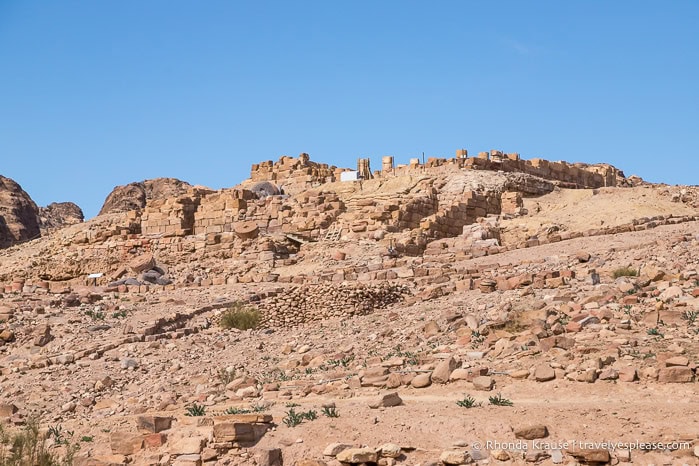 Ruins of the Temple of the Winged Lions on a hill.