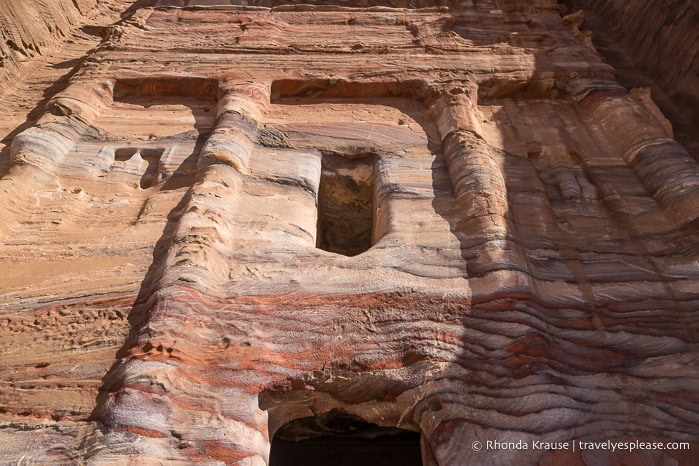 Colourful rock patterns on the front of the Silk Tomb.