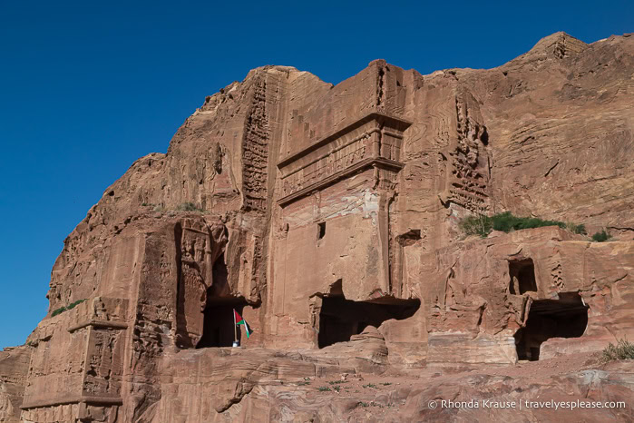 Tombs carved into a mountain.