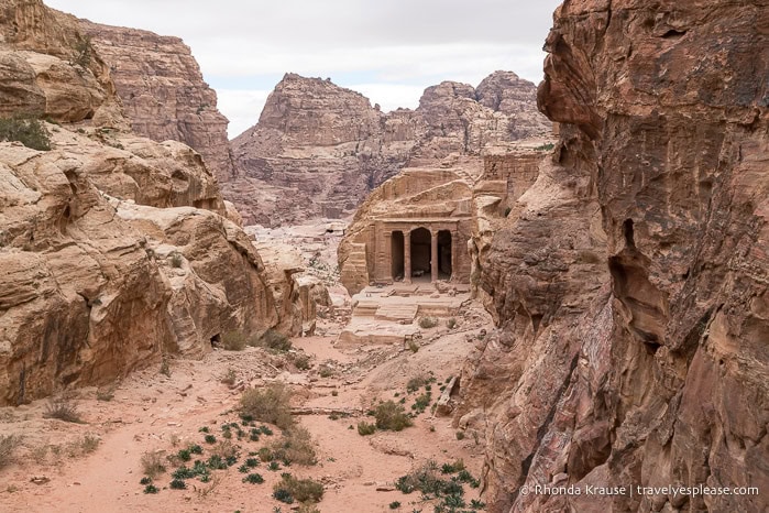 The Garden Triclinium framed by mountains.