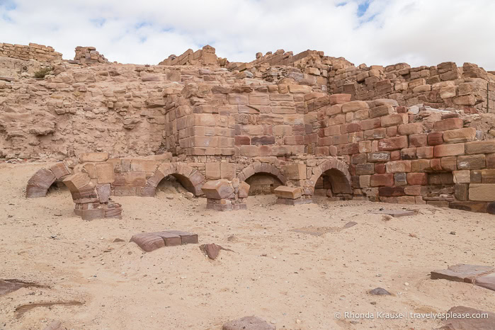 Partially buried arches at the Temple of the Winged Lions.