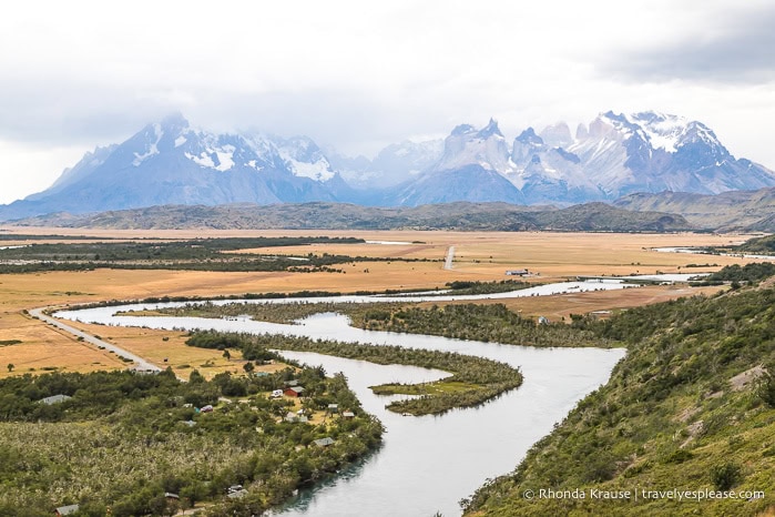 Serrano River backed by grasslands, foothills, and mountains.