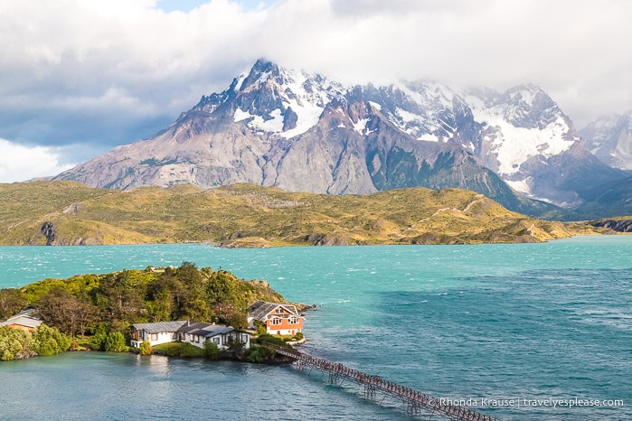 Island in Lago Pehoe with mountains in the background.