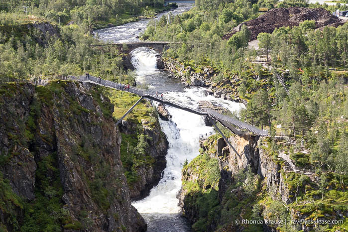 Step bridge crossing the Bjoreio River and waterfall.