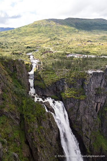 Vøringsfossen and the Bjoreio River with a hill in the background. 