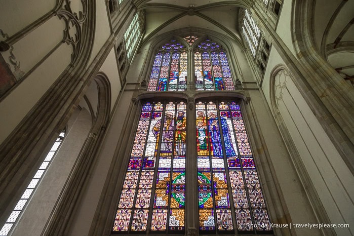 Tall stained glass window in the Dom Church.